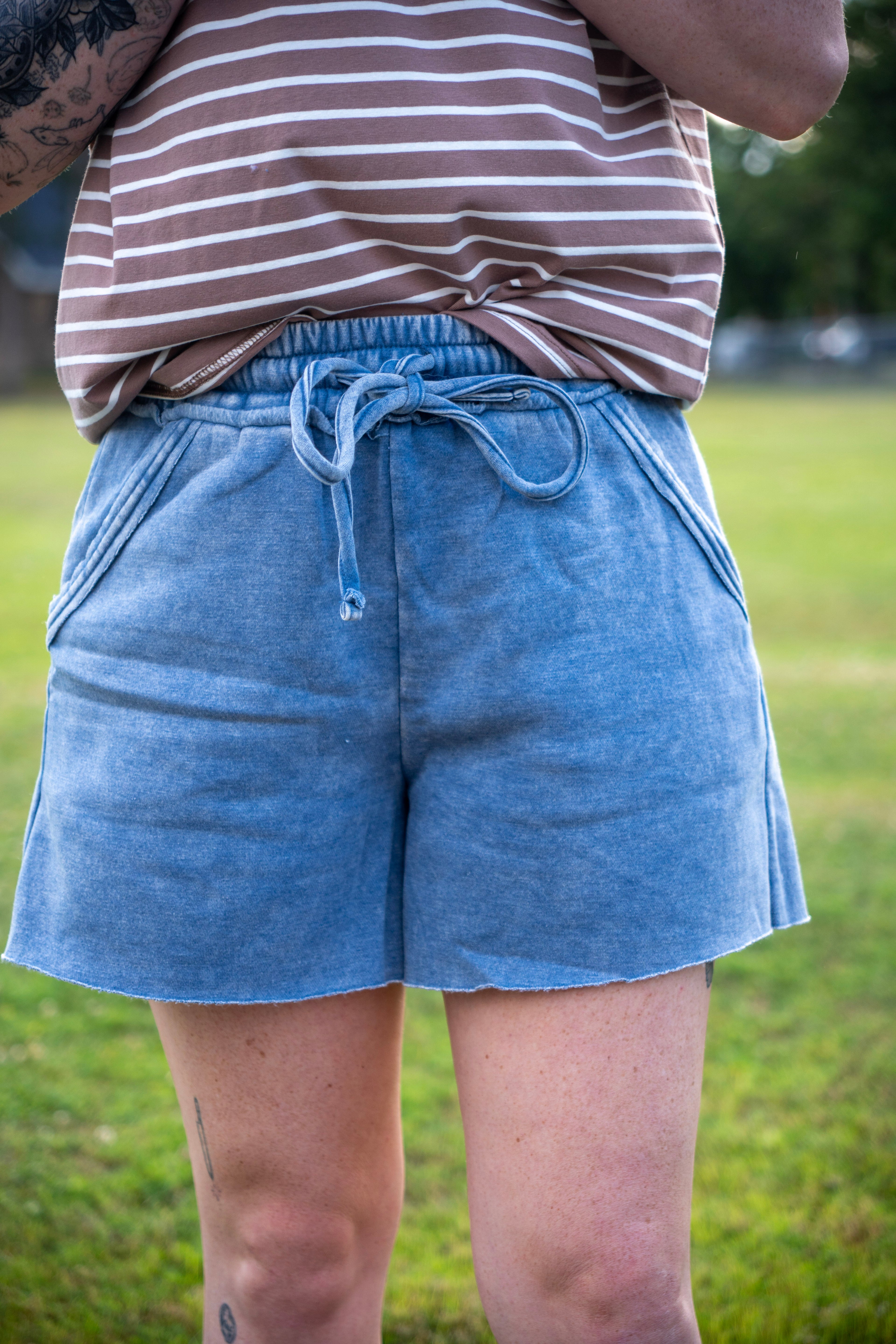 Acid wash fleece drawstring shorts with pockets